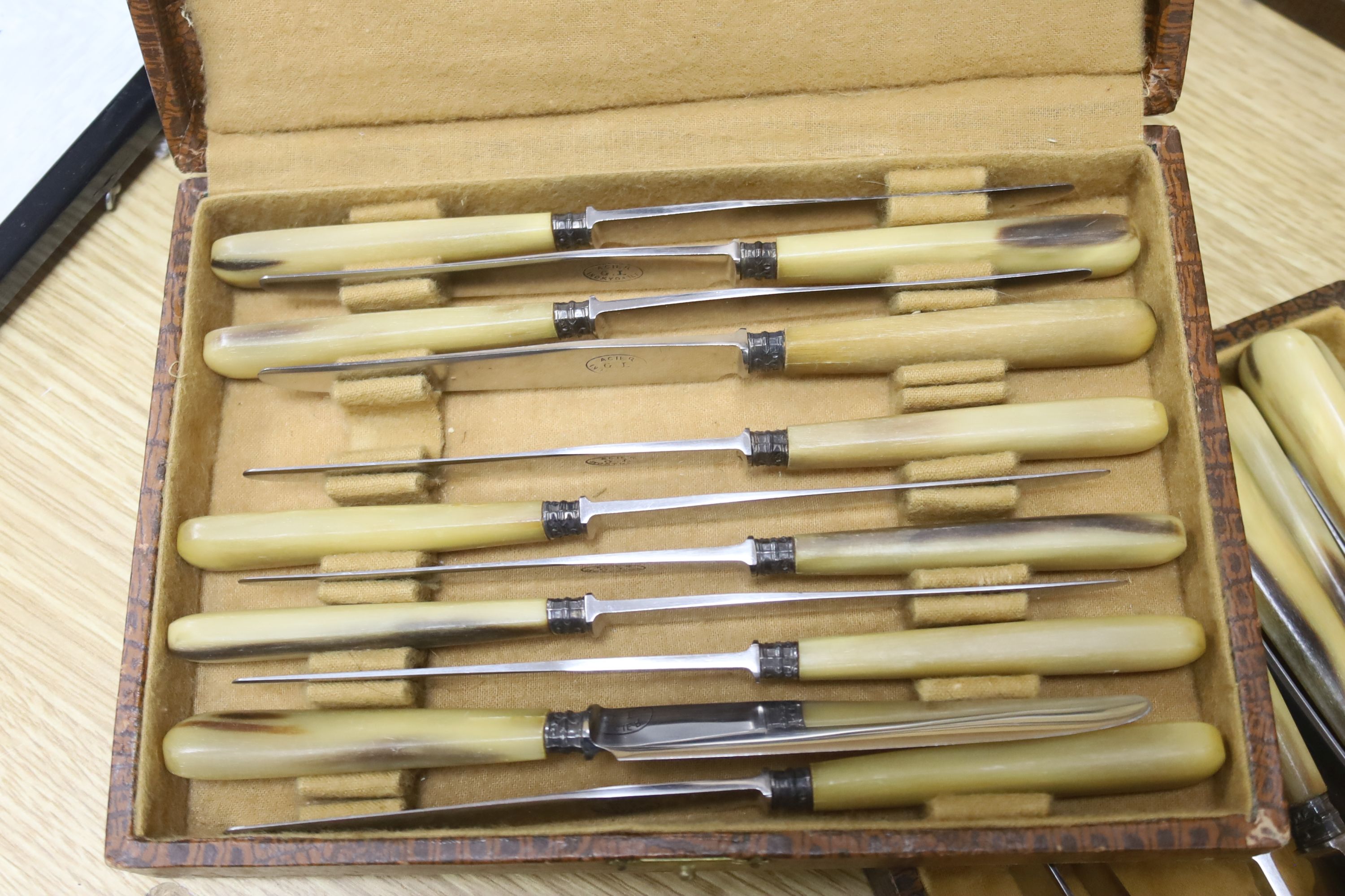 Three cased sets of horn handled flatware